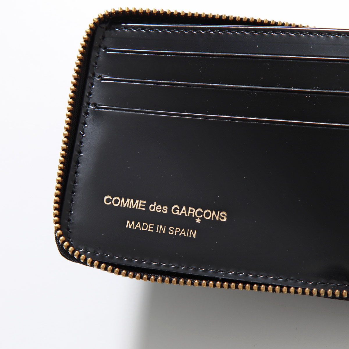 楽天市場】COMME des GARCONS コムデギャルソン 二つ折り財布 POLKA