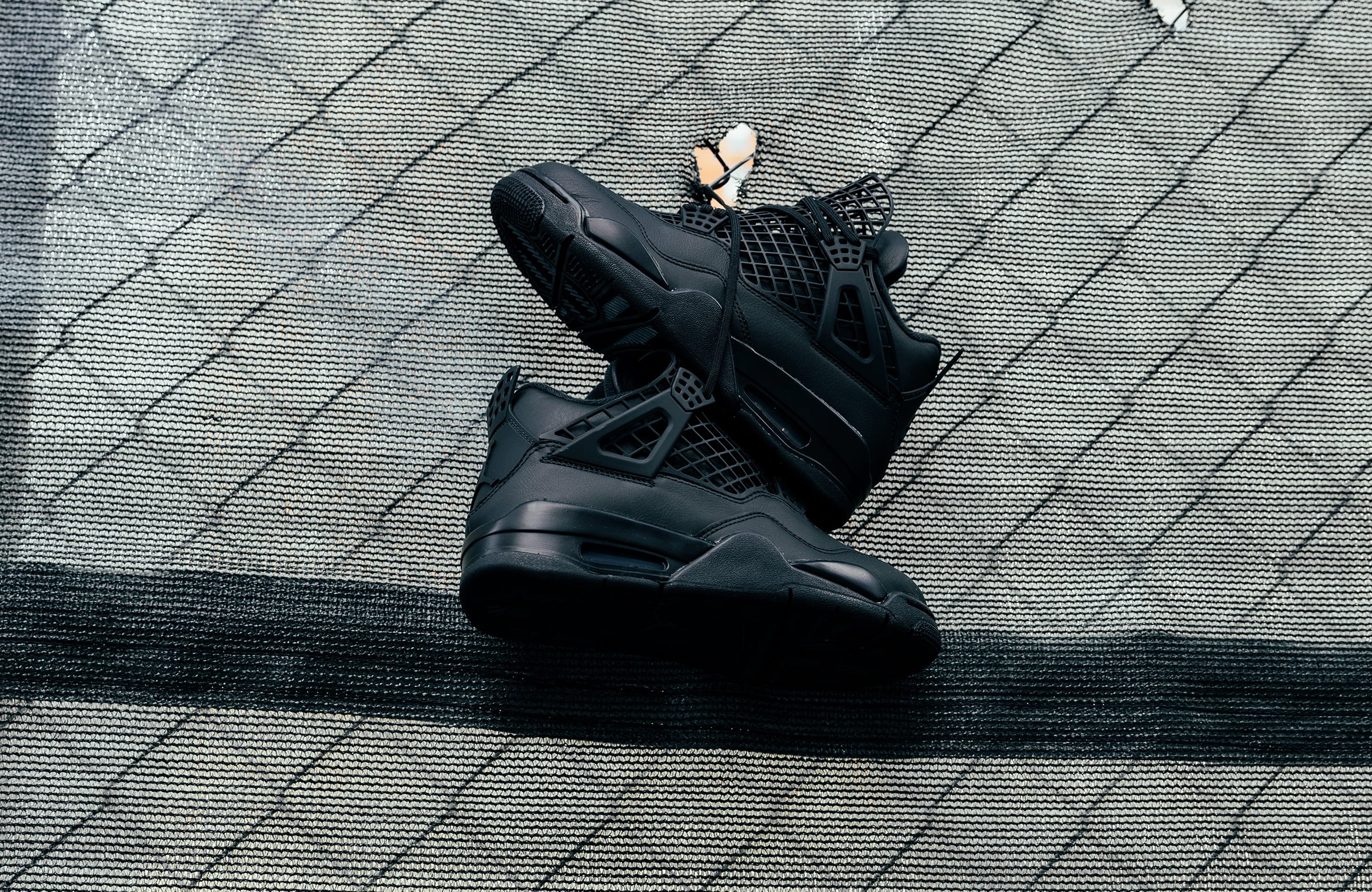 The Air Jordan 4 Net Arrives in Triple-Black – DTLR