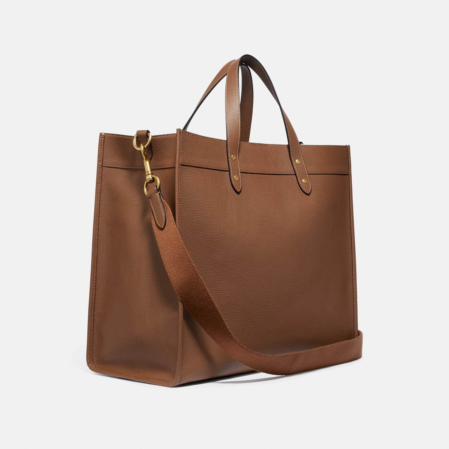 コーチの人気ビジネスバッグ「フィールド トート」オレンジロゴ入り