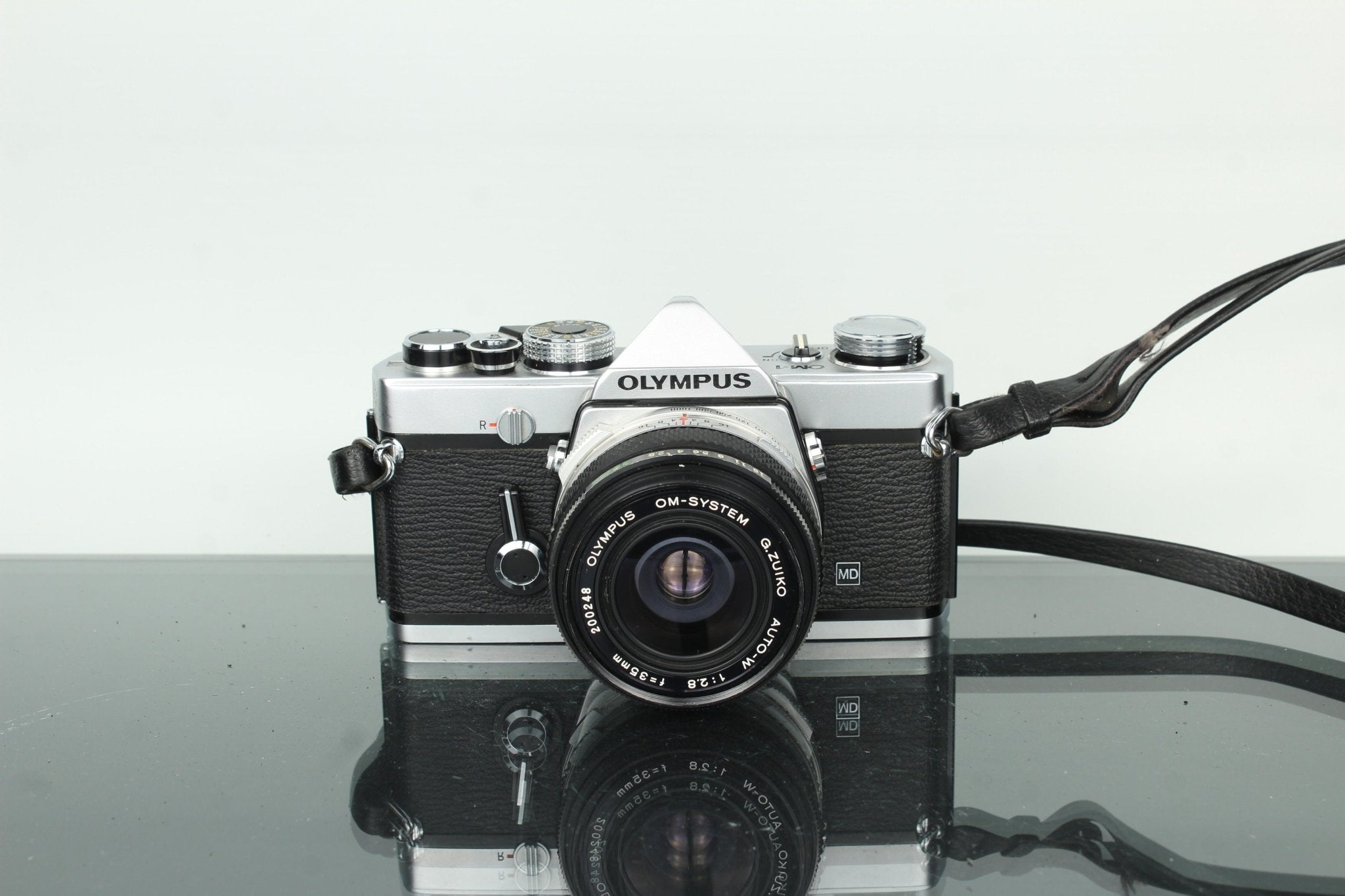 Olympus OM-1 SLR Film Camera with G.Zuiko 35mm f/2.8 Lens – Dutch