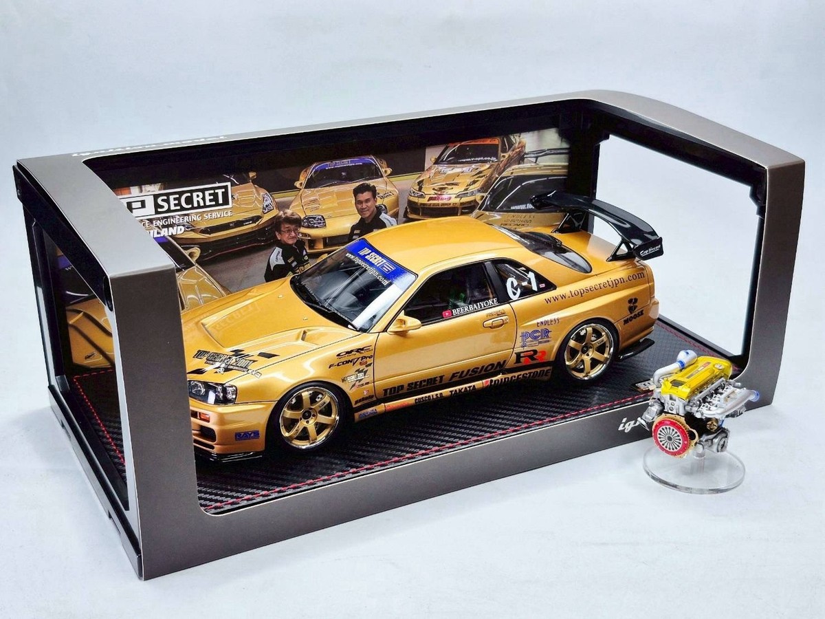 IG3799 – 1/18 TOP SECRET 34GT-R (BNR34) Gold Comes with RB26