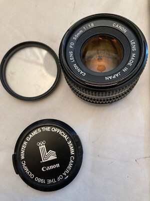 Canon Lens FD 50mm 1:1.8 lens cover and 52mm skylight filter JAPAN