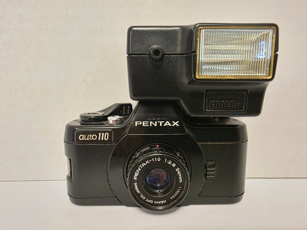 Pentax Auto 110 w/ 24mm Lens And Pentax AF100P Flash | eBay