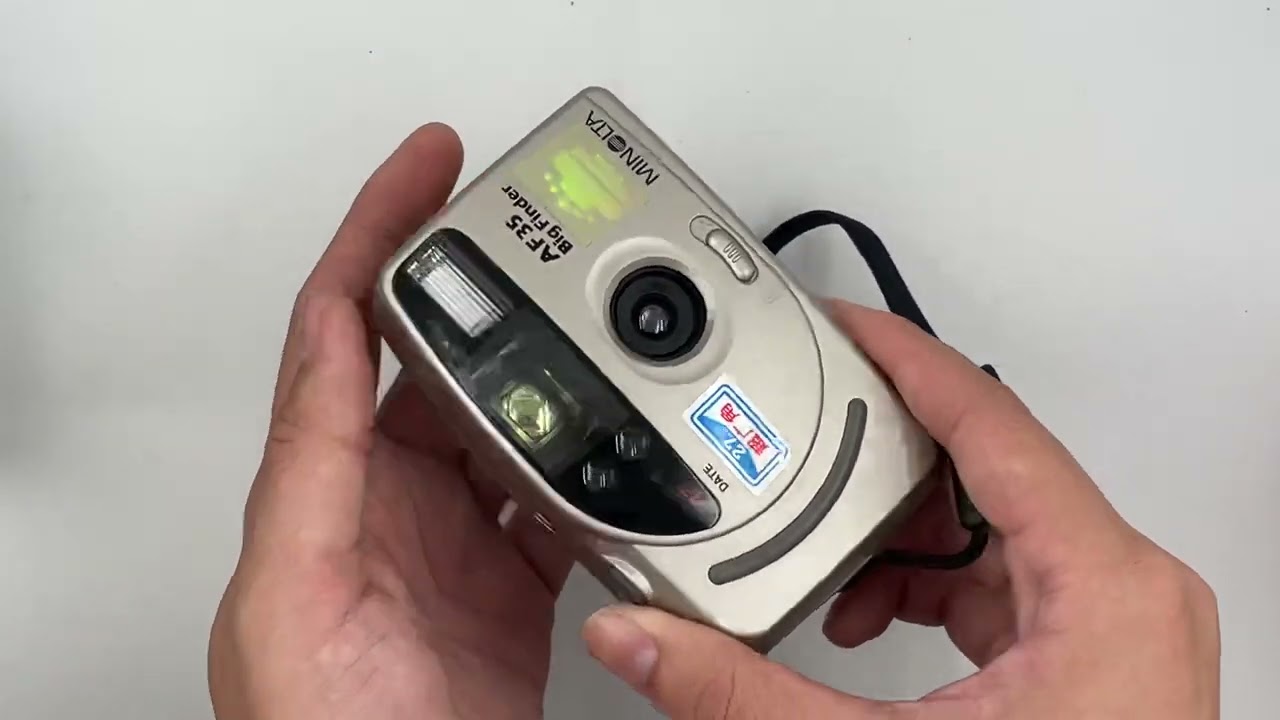 Minolta AF35 big viewfinder - YouTube