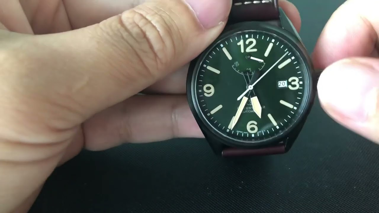 Black and bright Orient Star Sports Outdoor Green PVD Reference RK