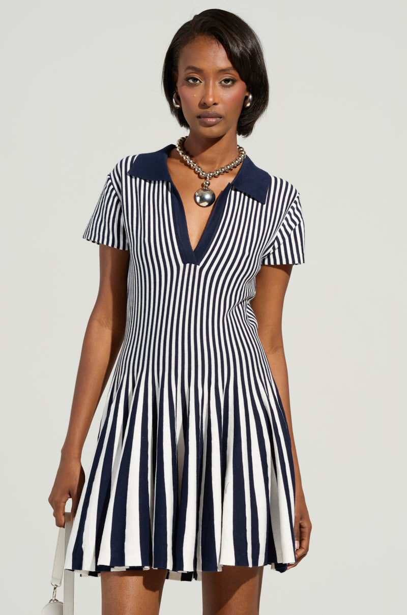 ALINA PLEATED KNIT FIT AND FLARE MINI DRESS IN NAVY – AKIRA