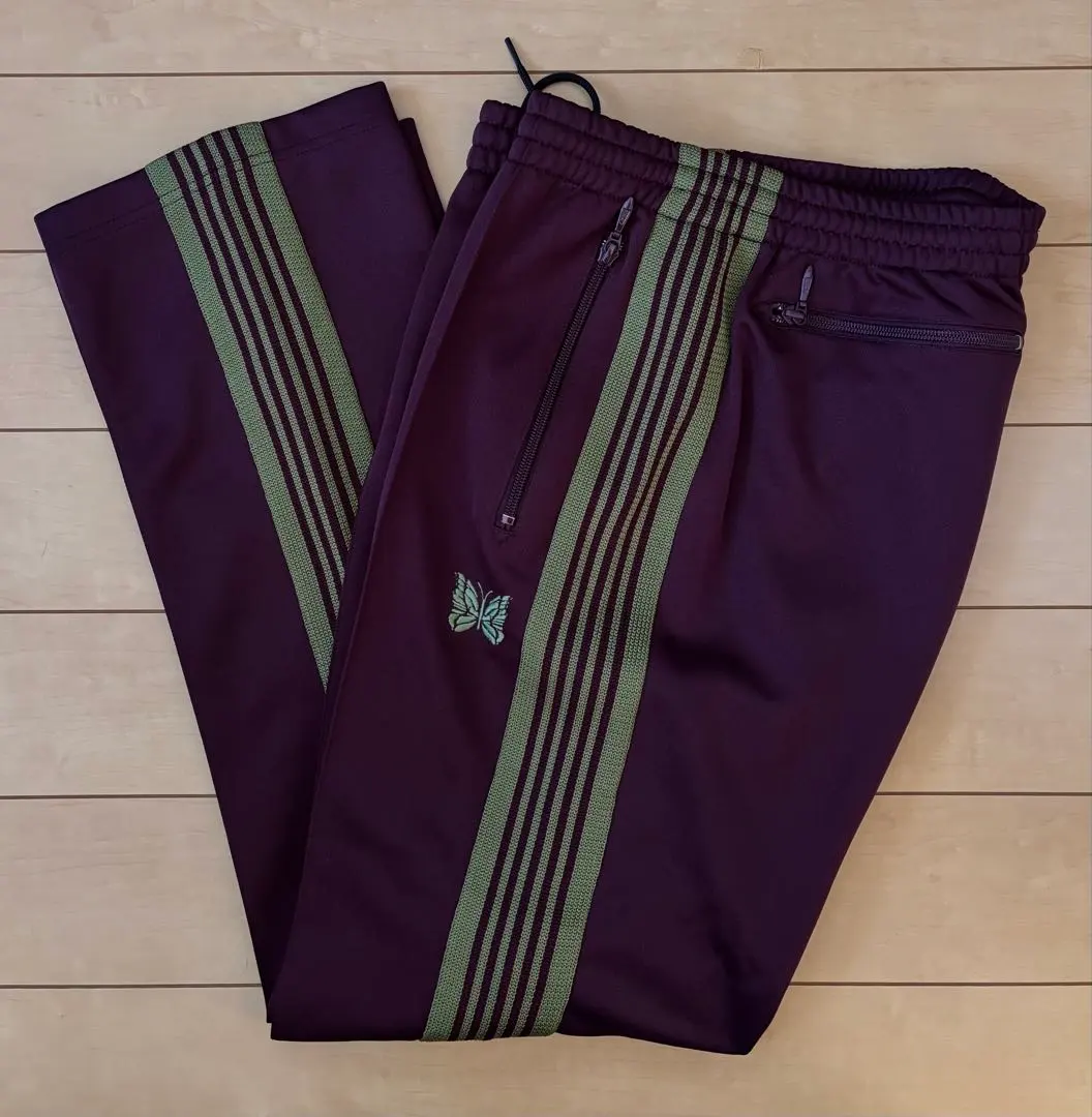 2026年最新】needles トラックパンツ マルーンの人気アイテム - メルカリ