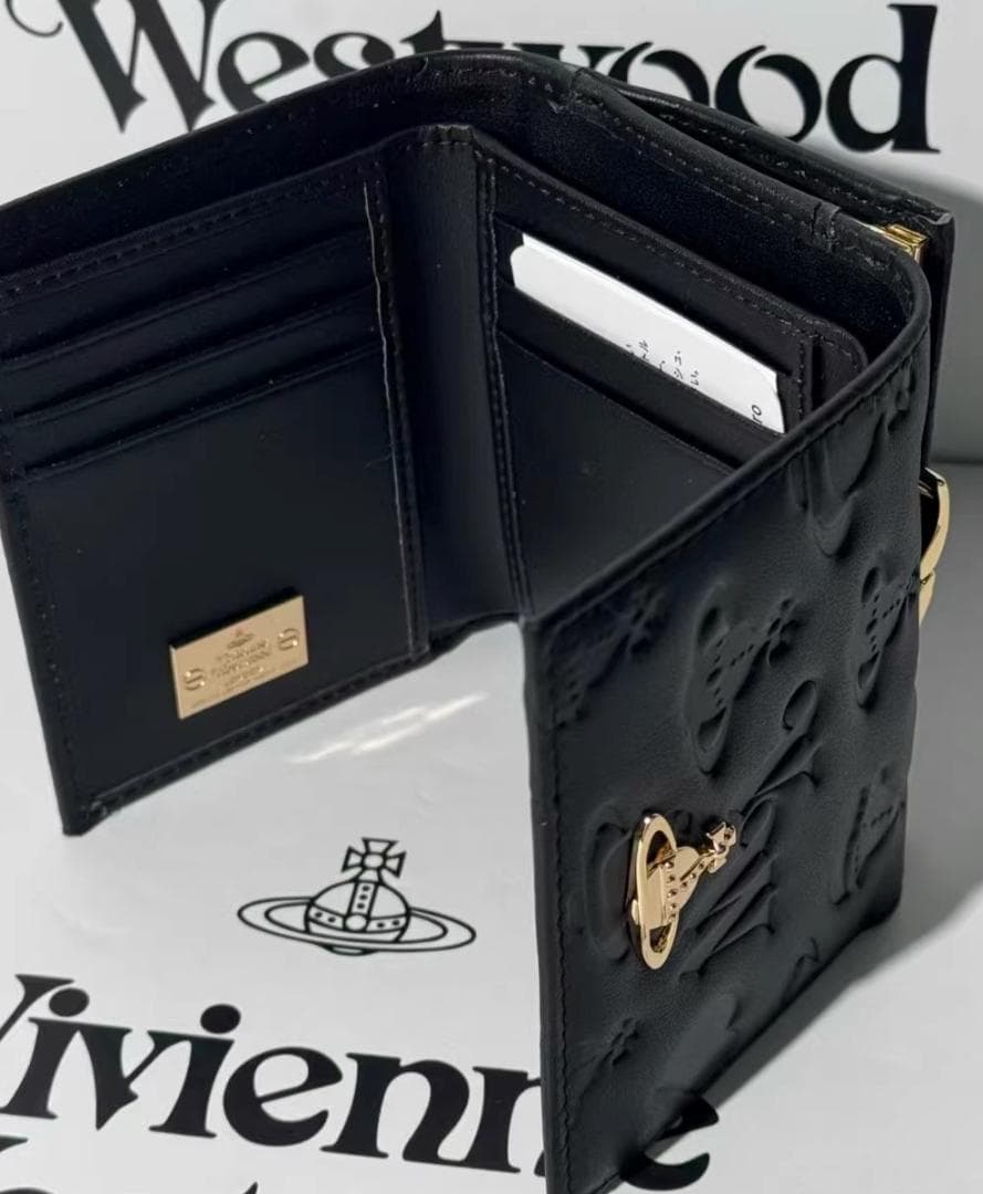 VVW いブラックエナメル型押しオーブ三つ折財布-110