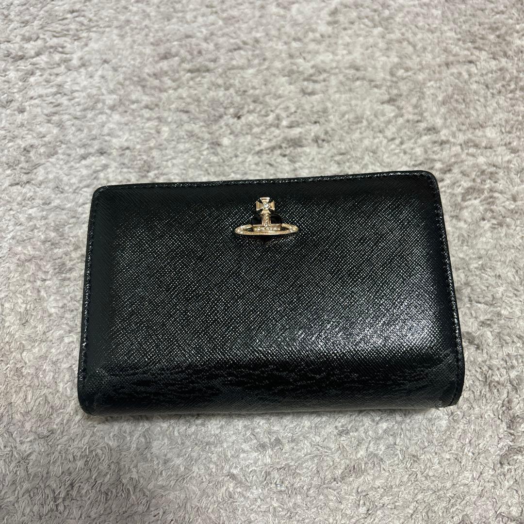 ヴィヴィアン】二つ折り財布 黒 ハート柄 - メルカリ