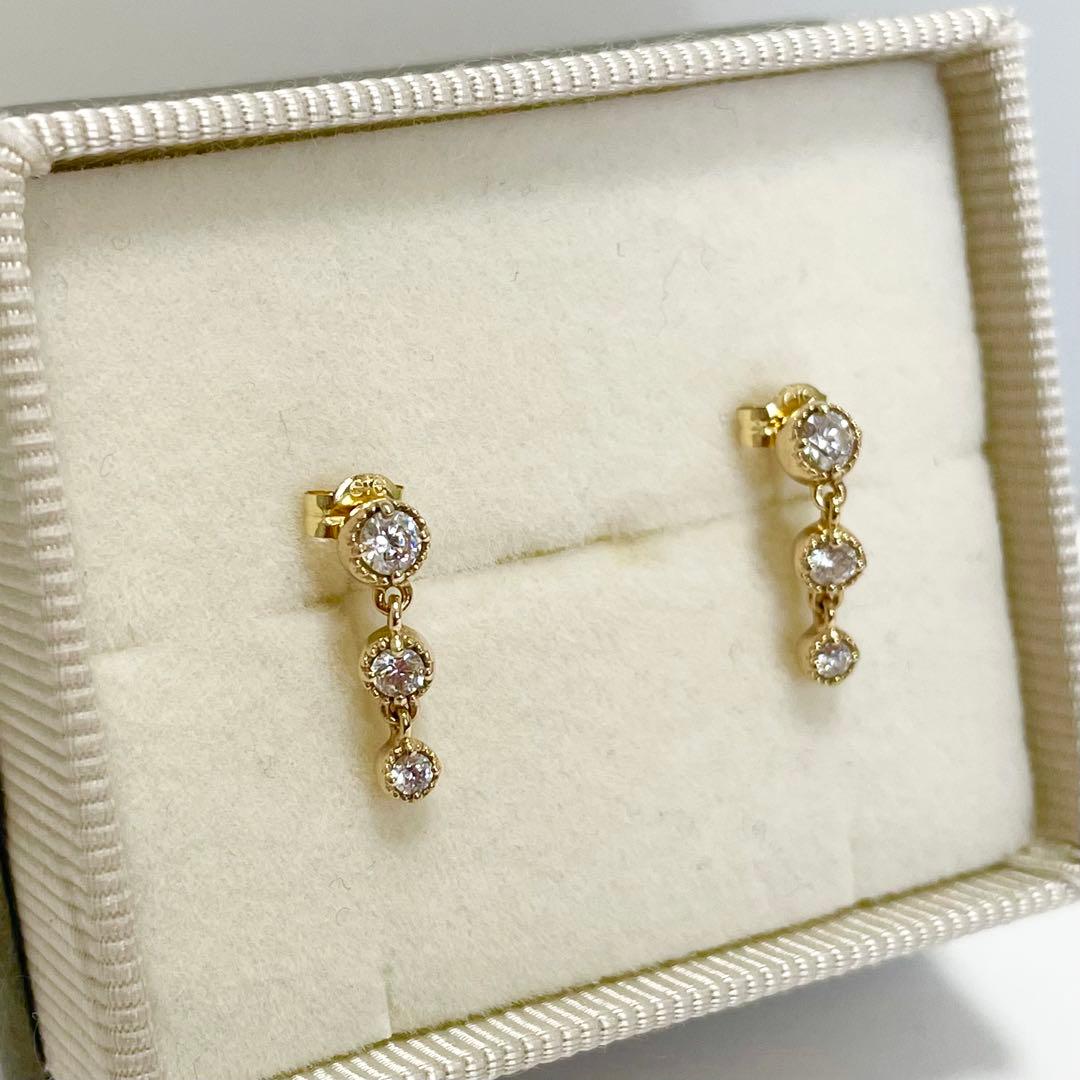 ete/スイング 3連ビジュー ピアス/YG /美品/SV925 K18 - メルカリ
