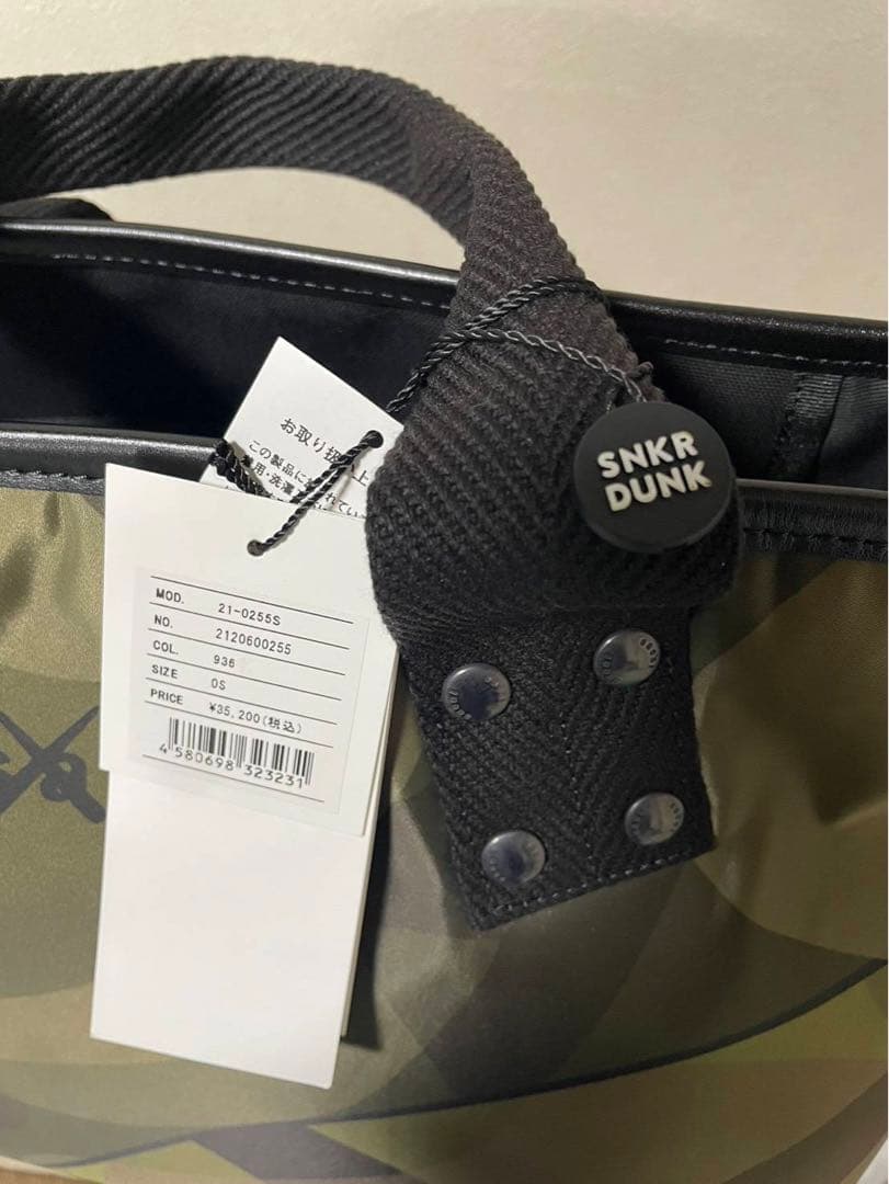 週末値下げ新品未使用sacai KAWS Bag \"Camo\"
