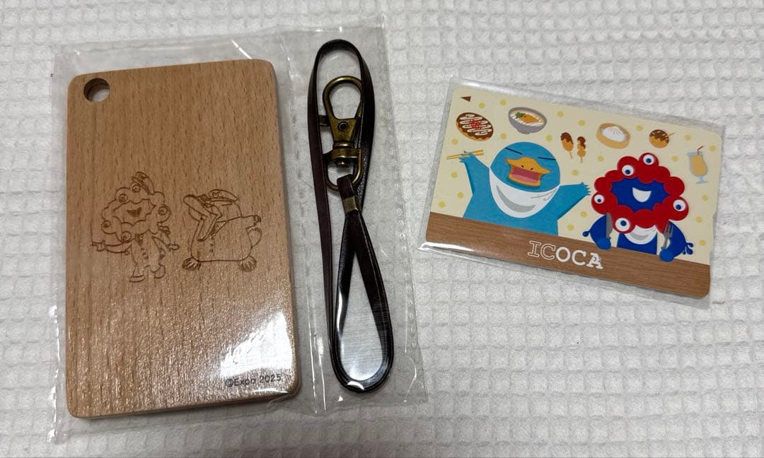 EXPO2025 関西万博 会場限定 万博記念限定ICOCAオリジナルパスケース Amazon.co.jp: 万博会場限定 ミャクミャク×イコちゃんICOCA 合皮パス