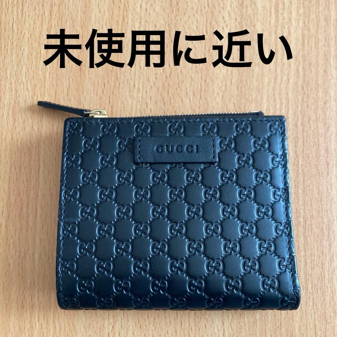 グッチ　二つ折り財布　ブラック グッチ 二つ折り財布 オフディア ストライプ ブラック 719887 (GUCCI