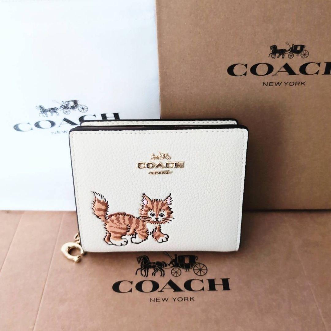 COACH コーチ ネコちゃん 二つ折り財布 - メルカリ