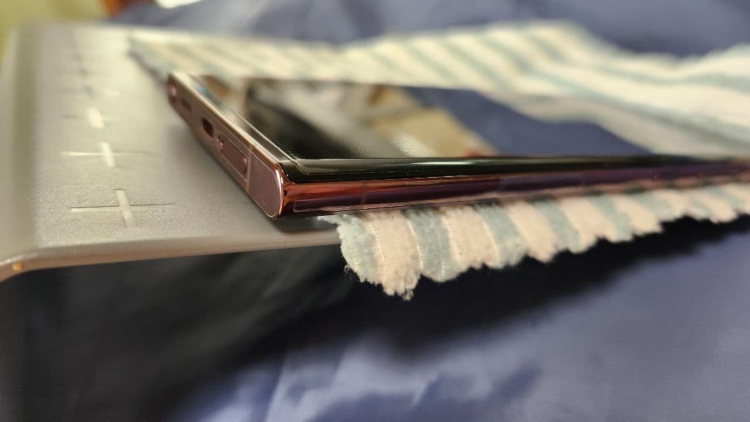 ‼️値引き中 中古良品‼️GalaxyS22Ultra au バーガンディ