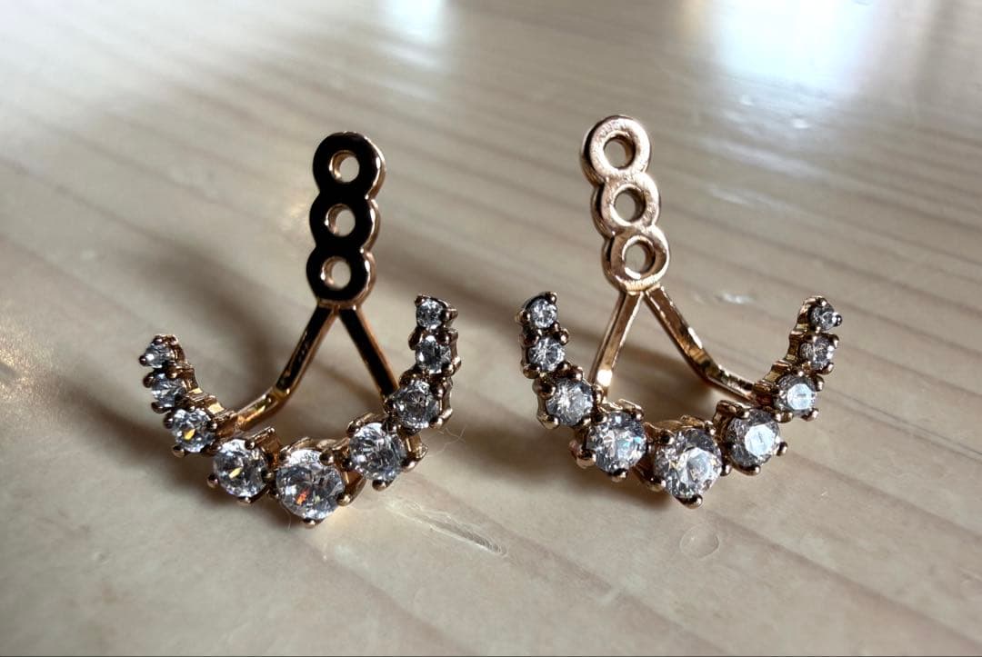 スワロフスキー ピアス ATELIER ペネロペ 愛の不時着 - メルカリ