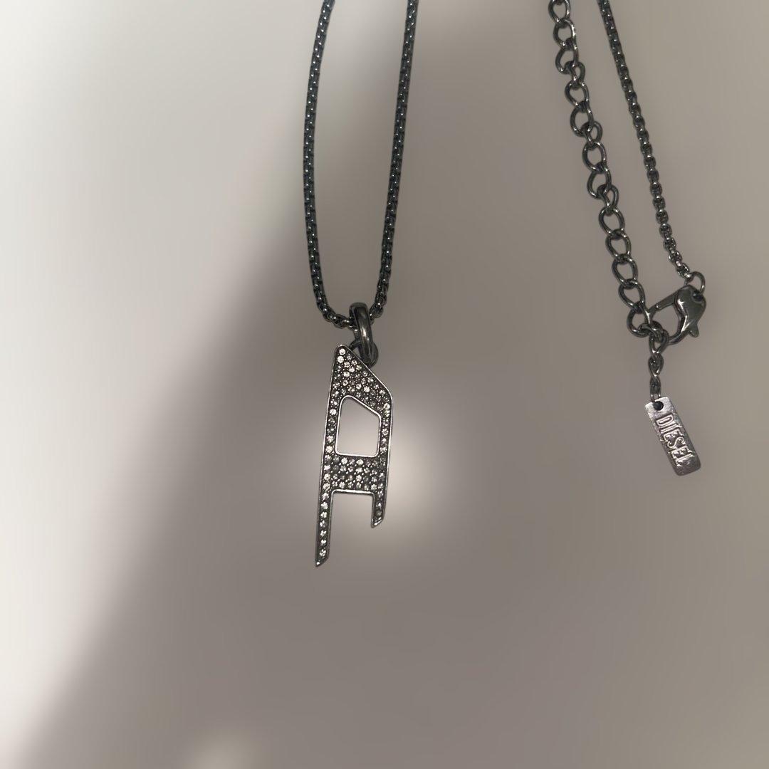 DIESEL A字型クリスタルネックレス - メルカリ