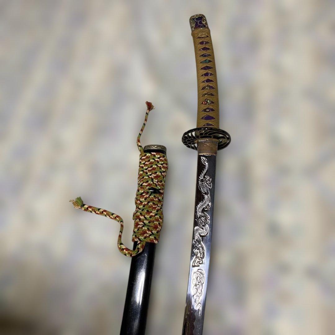 模造刀 太刀 金茶柄 鶴羽透し丸鍔 太刀造り龍図黒呂鞘 - メルカリ