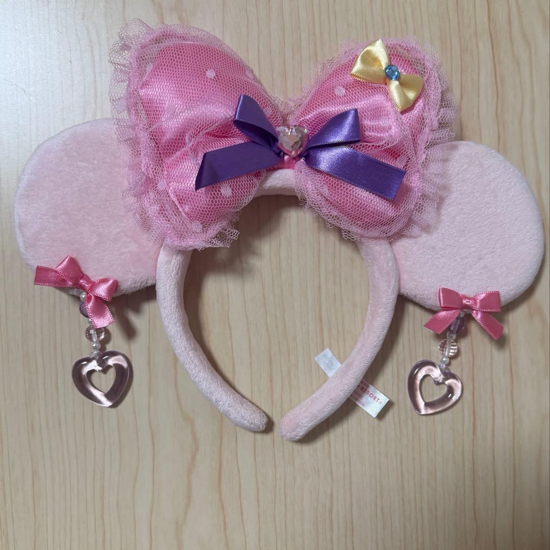 ピンク ミニーリボン付き耳イヤリングカチューシャ - メルカリ
