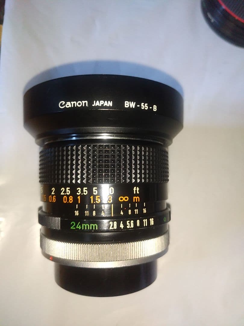Canon FD 24mm f/2.8 レンズ 純正フード／前後キャップは希少！ CANON FD 24mm F2.8｜フリッパーズ・ガイド
