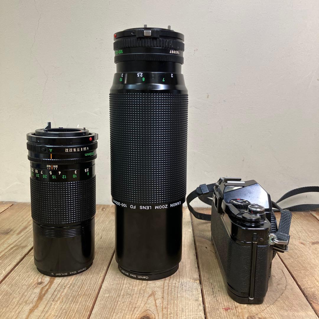 A-壁 Canon AV-1 フィルムカメラ レンズ2本セット アルミケース付
