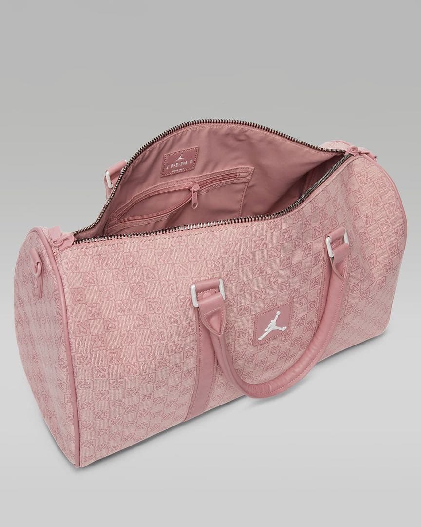 NIKE エアジョーダン モノグラム ダッフルバッグ ピンク - メルカリ