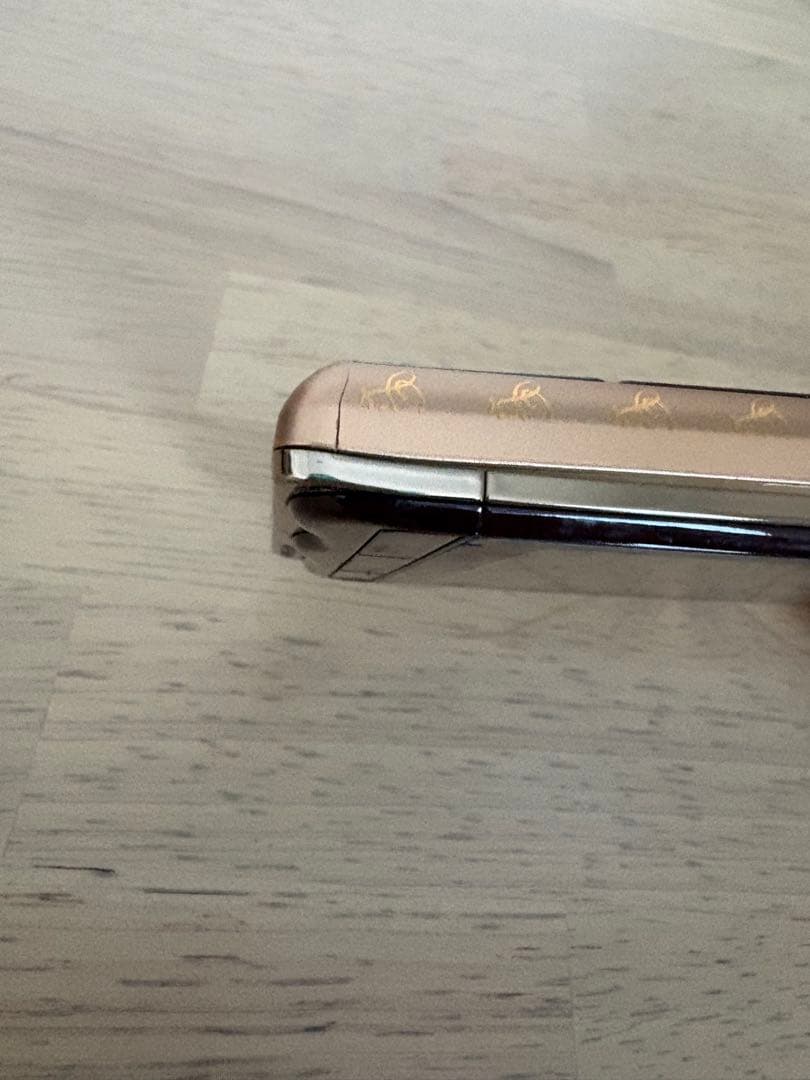 Q-pot.スマートフォン　チョコレート　ジャンク品