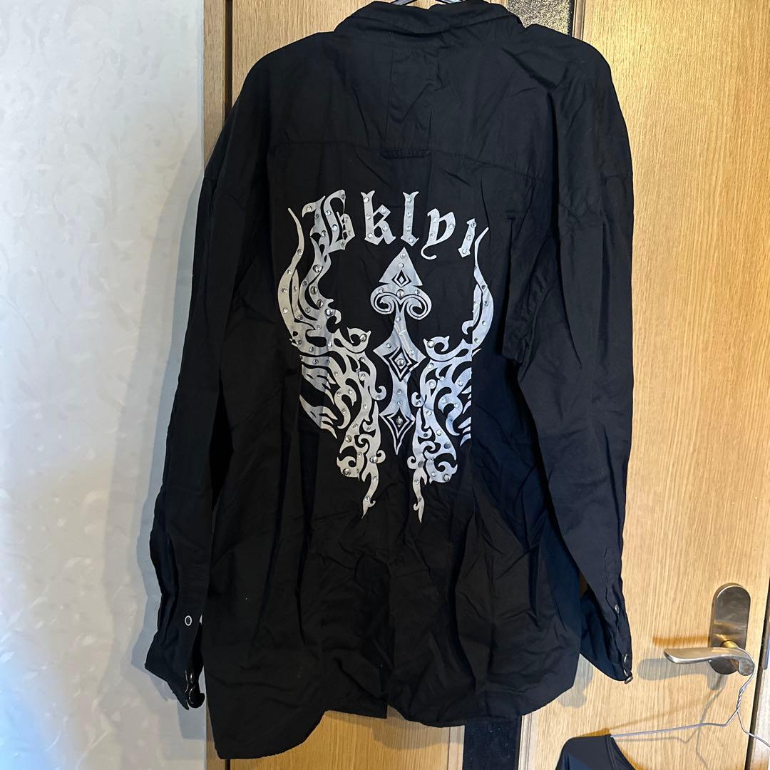 ブラック 長袖シャツ グラフィックプリント - メルカリ