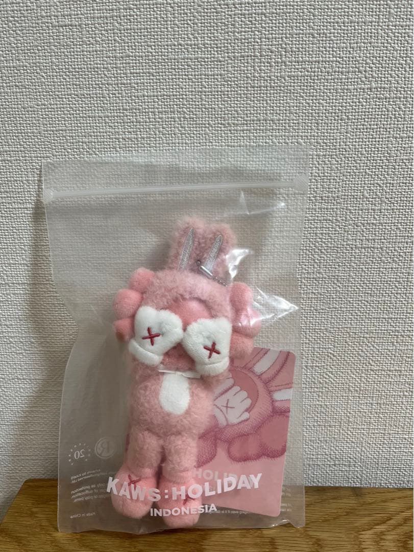 KAWS Holiday Indonesia Plush Charm pink | Shop at Mercari from