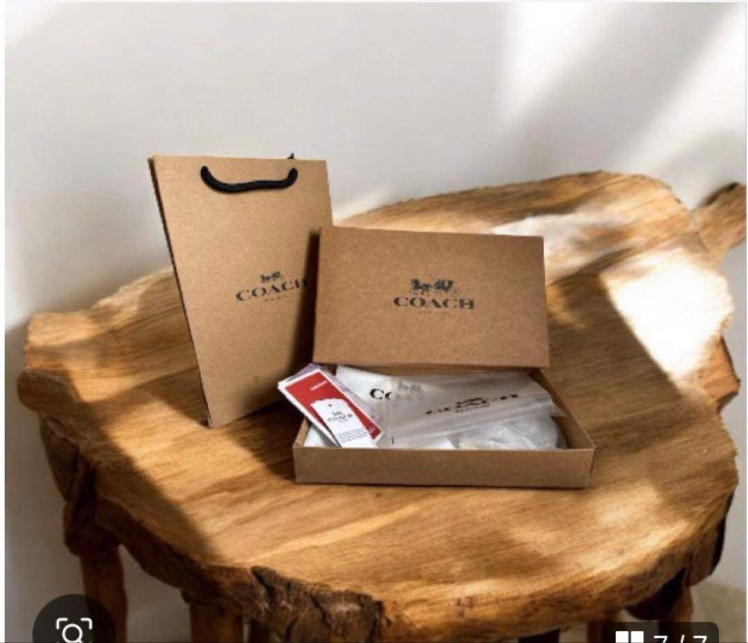 《新品》COACH 二つ折り財布