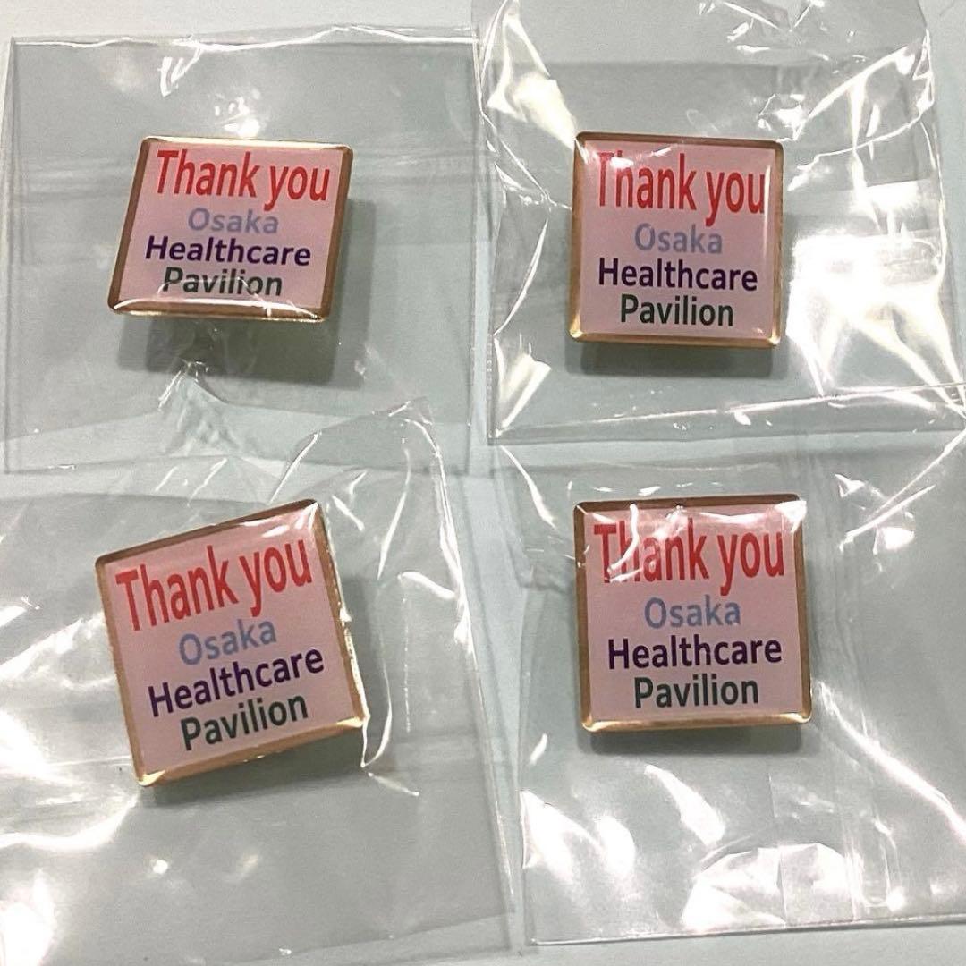 大阪ヘルスケアパビリオン ピンバッジ 4個セット - メルカリ