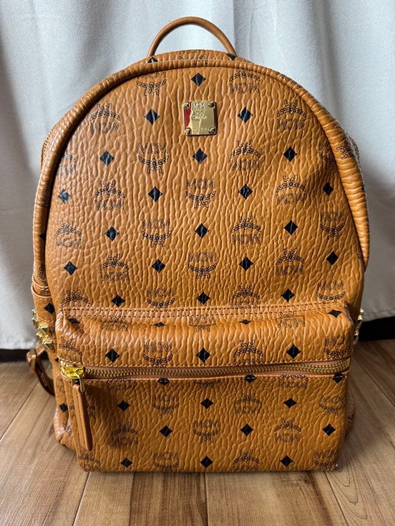 MCM ブラウンレザーリュック - メルカリ