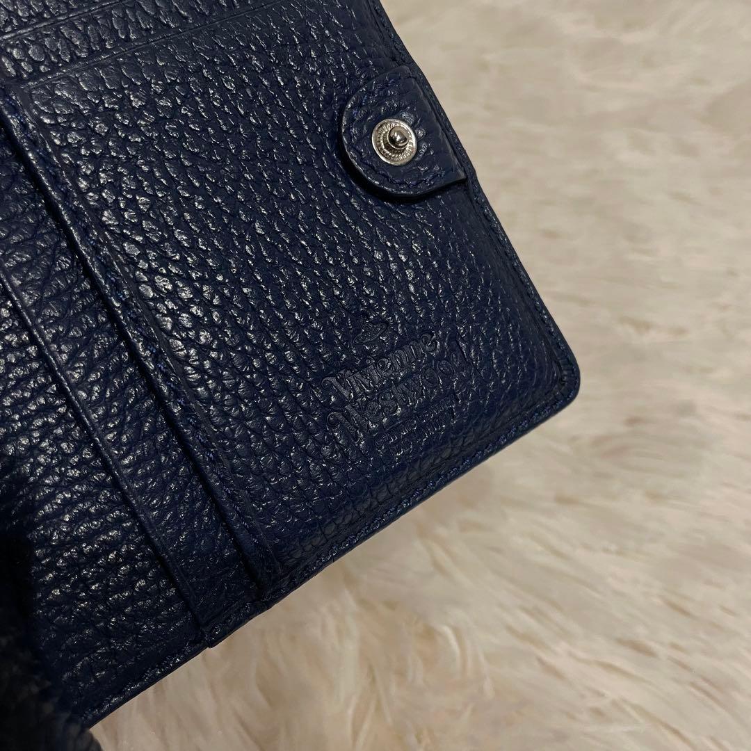 美品 ヴィヴィアンウエストウッド 二つ折り財布 シボ革 がま口