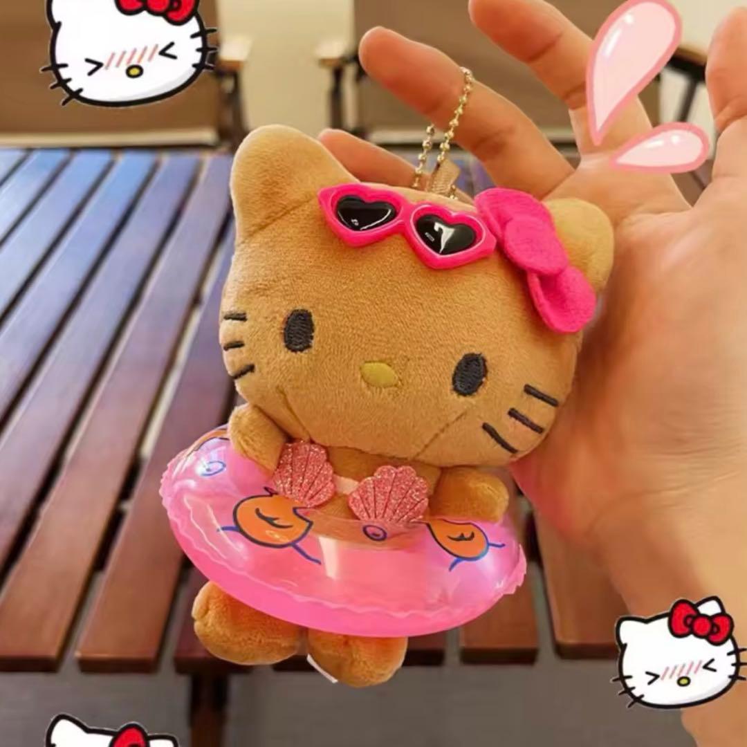 日焼けキティ マスコット キーホルダー 浮き輪 キティ ガングロ - メルカリ