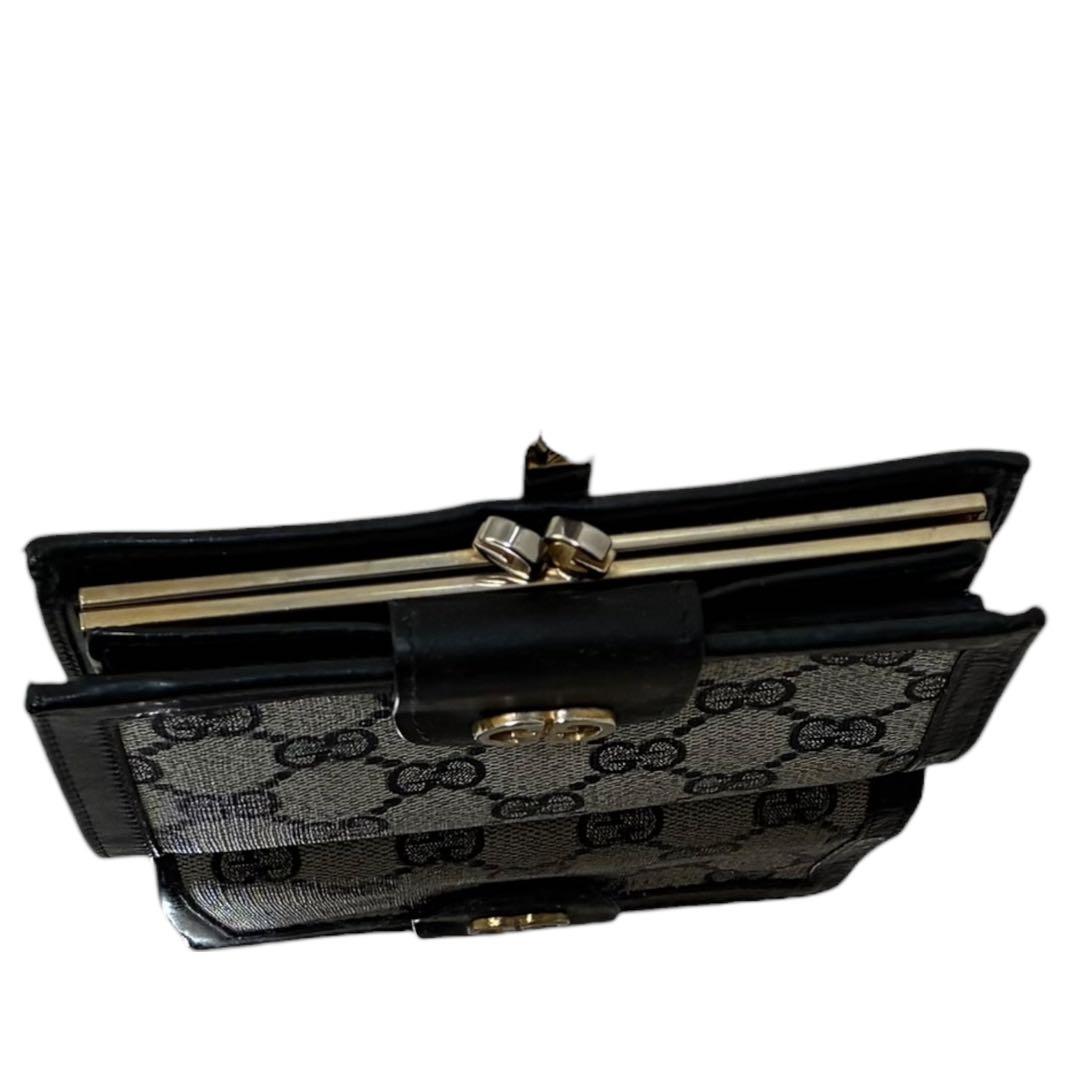 GUCCI GGキャンバス 二つ折り財布 ブラック がま口 - メルカリ